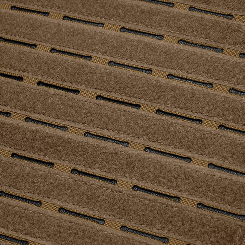Close-up of the Condor Elite LCS Vanquish Plate Carrier by Condor, featuring brown tactical fabric with evenly spaced horizontal slits and a black mesh layer underneath.
