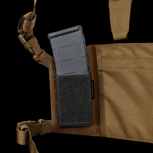 A close-up of the Condor LCS VAS Harness Kit in tan shows a black rifle magazine partially inserted into a Velcro-secured pocket, perfect for first responders or shooting range enthusiasts.