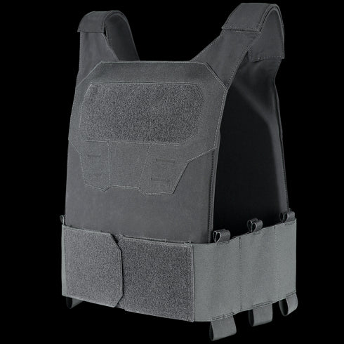 The Condor Specter Plate Carrier is a black tactical vest with front and side Velcro panels, designed to hold protective armor inserts for law enforcement or first responder use.