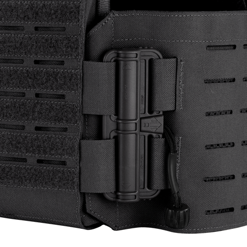 Close-up of the Condor Vanquish RS Plate Carrier in black, featuring a secured radio attached to the side with nylon straps and a cord.