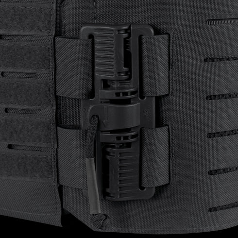Close-up of a black plastic buckle and strap system on textured fabric, featured on the Vanquish RS Plate Carrier by Condor.