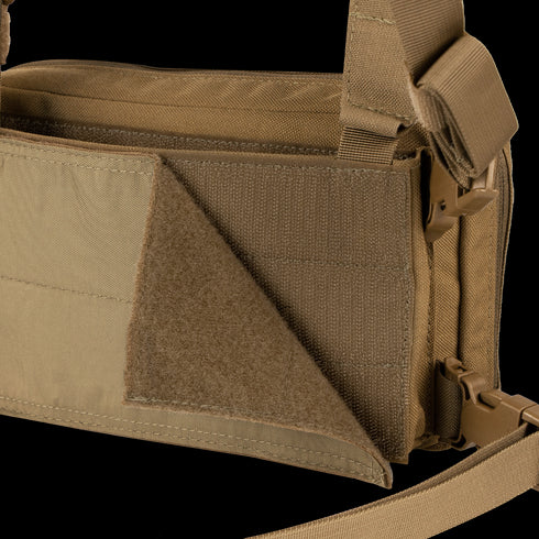 Close-up of the Condor Stowaway Chest Rig in tan, featuring a rugged texture and partially open Velcro flap—designed for military and first responder use.