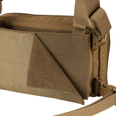 Close-up of the Condor Stowaway Chest Rig in tan, featuring a rugged texture and partially open Velcro flap—designed for military and first responder use.