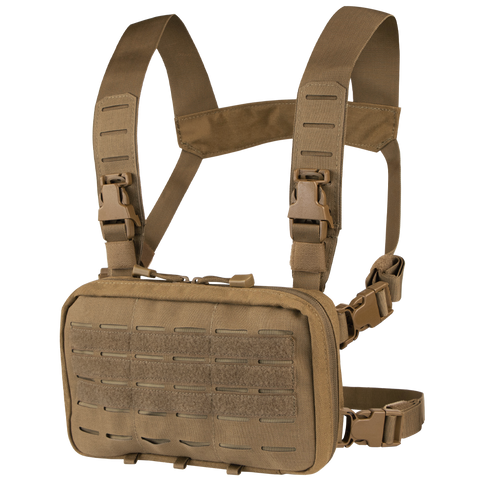 The Condor Stowaway Chest Rig is a tan tactical rig with adjustable straps, plastic buckles, a front pouch with MOLLE webbing, and hook-and-loop panels—ideal for military and first responder use.