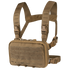 The Condor Stowaway Chest Rig is a tan tactical rig with adjustable straps, plastic buckles, a front pouch with MOLLE webbing, and hook-and-loop panels—ideal for military and first responder use.