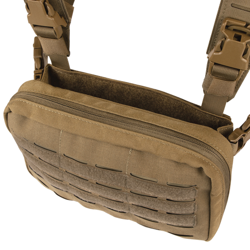 The Condor Stowaway Chest Rig is a tan tactical shoulder bag with MOLLE webbing, zippered main compartment, and adjustable straps; ideal for military or first responders. Black container shown in background.