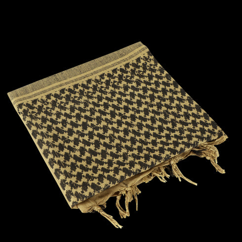 A Condor Shemagh in tan & black with a patterned design and tasseled edges is shown folded on a plain background, perfect for use as headwear or protective gear.