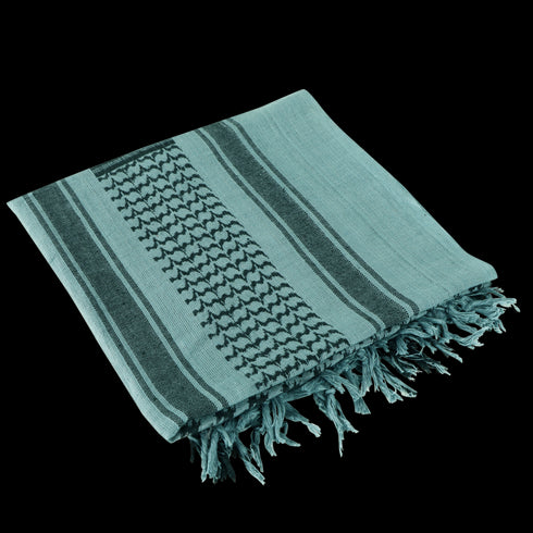 A folded Condor Shemagh in foliage & black with fringed edges, ideal as stylish headwear or an extra protective layer.