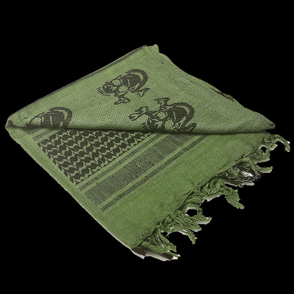 The Condor Shemagh - Skull is a green scarf with black skull patterns and fringe edges, featuring decorative designs and displayed folded on a white background.