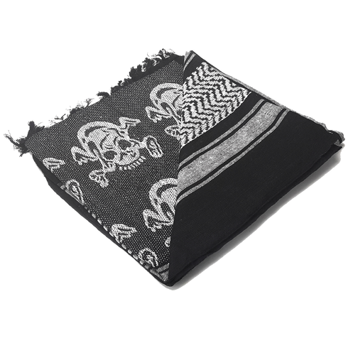 The Condor Shemagh - Skull is a folded black and white scarf with skull patterns and geometric designs, finished with frayed edges on one side.