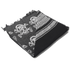 The Condor Shemagh - Skull is a folded black and white scarf with skull patterns and geometric designs, finished with frayed edges on one side.