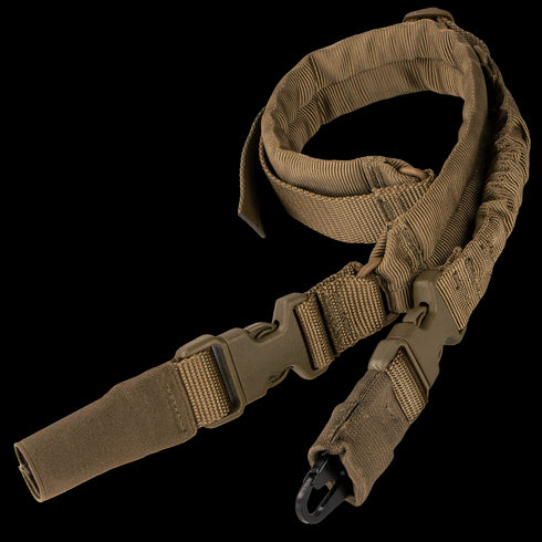 The Condor Swiftlink Padded Bungee Sling in Coyote Brown, featuring adjustable straps, plastic buckles, and a metal clip, offers tactical versatility and efficiency, shown coiled on a white background.