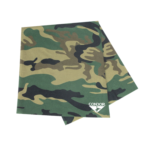 The Condor Multi Wrap in Woodland features green, brown, and black camouflage patterns with a white Condor logo on one corner. This versatile headwear is perfect for outdoor adventures and multiple uses.