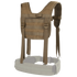 The Condor H-Harness in tan features adjustable straps and MOLLE webbing, shown on a white background with a partially transparent belt section.