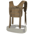 The Condor H-Harness in tan features adjustable straps and MOLLE webbing, shown on a white background with a partially transparent belt section.