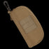 The Condor Sunglasses Case is a tan tactical pouch featuring a zipper, front MOLLE webbing, and a black carabiner clip on one end.