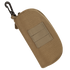The Condor Sunglasses Case is a tan tactical pouch featuring a zipper, front MOLLE webbing, and a black carabiner clip on one end.