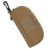 The Condor Sunglasses Case is a tan tactical pouch featuring a zipper, front MOLLE webbing, and a black carabiner clip on one end.