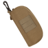 The Condor Sunglasses Case is a tan tactical pouch featuring a zipper, front MOLLE webbing, and a black carabiner clip on one end.
