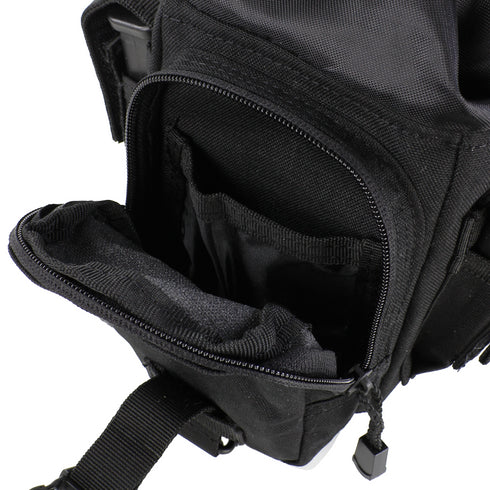 Close-up of the Condor Cross Over Leg Rig, a black tactical bag featuring multiple zippered compartments and interior pockets with detailed stitching—perfect for military or law enforcement use.