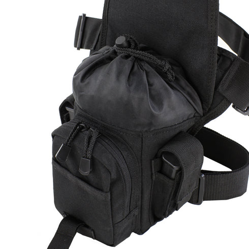 The Condor Cross Over Leg Rig is a black tactical bag featuring multiple zippered compartments, adjustable straps, and a top drawstring closure—perfect for law enforcement or shooting range use.