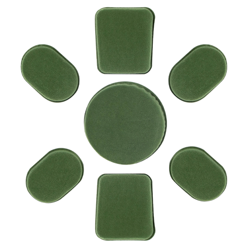 Seven green Condor Helmet Pads II, including one large round pad and six smaller rectangular and oval pads, are arranged in a circle on a white background.