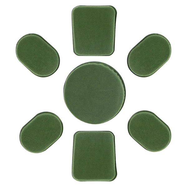 Seven green Condor Helmet Pads II, including one large round pad and six smaller rectangular and oval pads, are arranged in a circle on a white background.