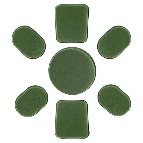 Seven green Condor Helmet Pads II, including one large round pad and six smaller rectangular and oval pads, are arranged in a circle on a white background.