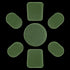 Seven green Condor Helmet Pads II, including one large round pad and six smaller rectangular and oval pads, are arranged in a circle on a white background.
