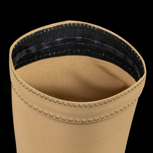 Close-up of Condor Arm Sleeves showing the beige opening with zigzag stitching and a black elastic band inside the edge, designed for moisture-wicking comfort.