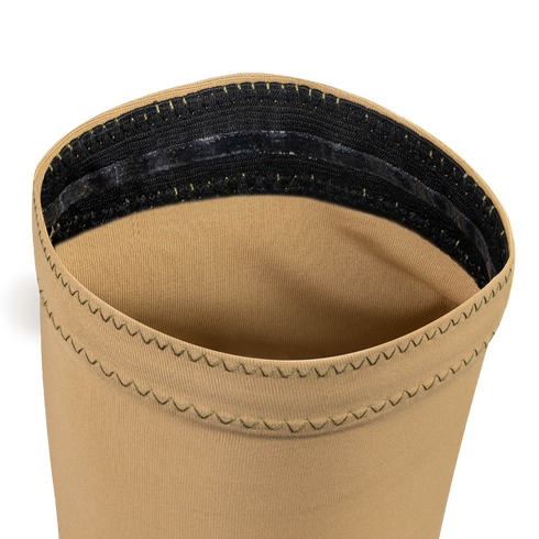 Close-up of Condor Arm Sleeves showing the beige opening with zigzag stitching and a black elastic band inside the edge, designed for moisture-wicking comfort.