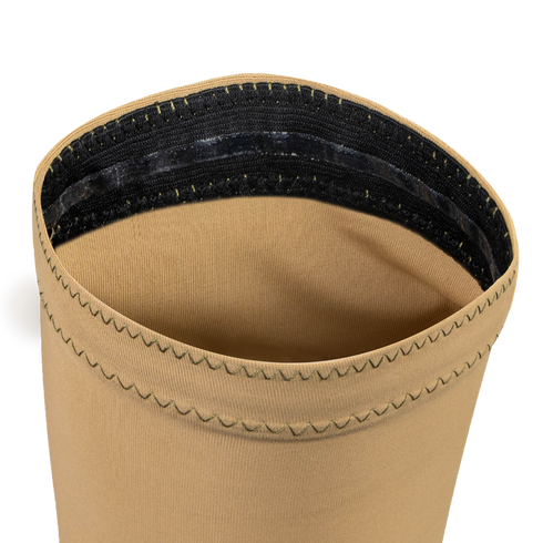 Close-up of Condor Arm Sleeves showing the beige opening with zigzag stitching and a black elastic band inside the edge, designed for moisture-wicking comfort.