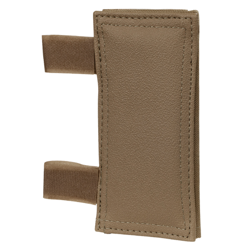 The Condor Shoulder Pad PC is a rectangular brown textured pad with two elastic loops on the left side, designed for tactical gear or shock protection.
