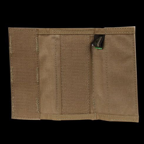 The Condor Shoulder Pad PC, inspired by tactical gear, features durable material and multiple compartments, making it a practical everyday accessory.