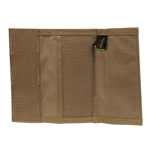 The Condor Shoulder Pad PC, inspired by tactical gear, features durable material and multiple compartments, making it a practical everyday accessory.