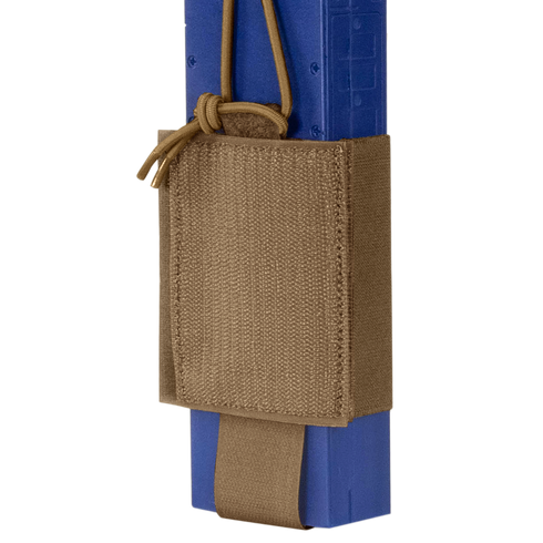 The Condor VAS Wing Pouch, made from tan tactical nylon, securely holds a blue training magazine with an adjustable cord—ideal for military or first responders.