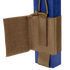 A close-up of the Condor VAS Wing Pouch in tan, designed for EDC or bushcraft, securely holds a blue rectangular object with adjustable straps and a hook-and-loop flap.