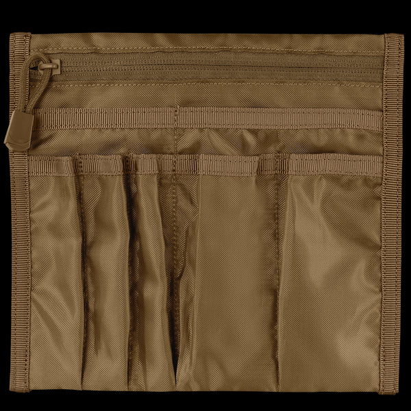 The Condor VA Organizer is a brown nylon pouch featuring multiple vertical pockets and a top zippered compartment—perfect for EDC or bushcraft essentials.