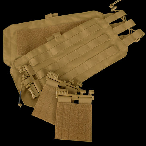 Two tan Condor RS Cummerbund Retro Kit panels with MOLLE webbing and Velcro, featuring sturdy plastic clips and straps, are laid out on a flat surface. Designed for tactical use.