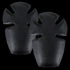 Two black, curved Condor Elbow Pad Inserts with cross-shaped cutouts, designed for insertion into clothing or gear for added protection—ideal for First Responders or Law Enforcement.