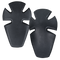 Two black, symmetrical Condor Knee Pad Inserts with groove cutouts, made of plastic, are shown side by side on a transparent background—ideal for EDC or first responder gear.