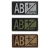 The Condor Blood Type Patch comes in three color variants—black/white, black/green, and brown/tan—clearly displaying AB+ POS for quick identification of AB positive blood type in the field.