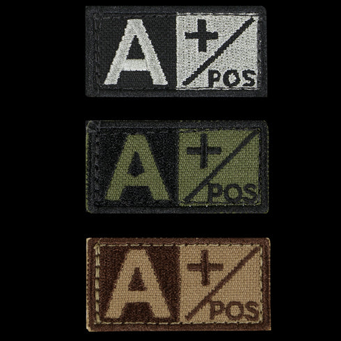 The Condor Blood Type Patch displays A+ POS in black, green, and brown designs. Each patch features a plus sign and diagonal line for easy identification, making them ideal for military or EDC use at the shooting range.