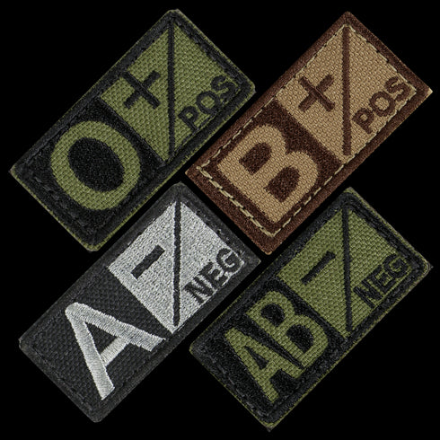 The Condor Blood Type Patch set includes four embroidered patches—O positive, B positive, A negative, and AB negative—in varied color schemes with a diagonal layout, ideal for military use or shooting range trips.