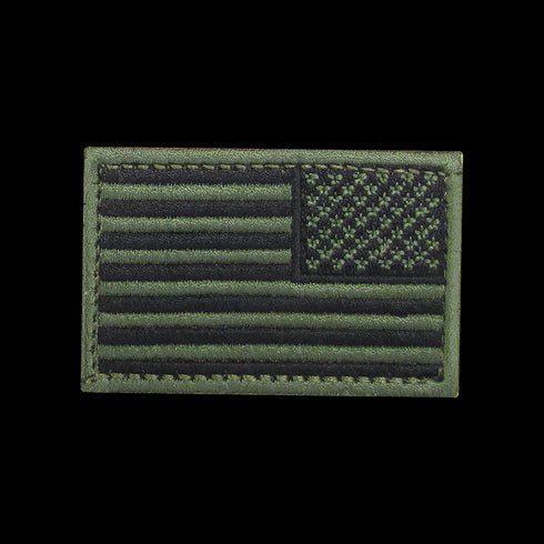 The Condor Reversed Flag Patch features a subtle green and black embroidered design of the United States flag.