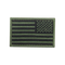 The Condor Reversed Flag Patch features a subtle green and black embroidered design of the United States flag.