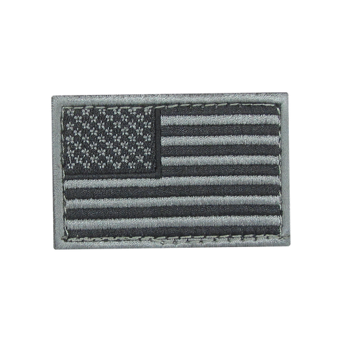 The Condor US Flag Patch features a grayscale American flag with stars in the upper left and horizontal stripes, ideal for law enforcement or shooting range enthusiasts.