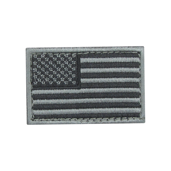 The Condor US Flag Patch features a grayscale American flag with stars in the upper left and horizontal stripes, ideal for law enforcement or shooting range enthusiasts.