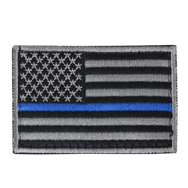 The Condor US Flag Patch features a black and white American flag with a single blue stripe across the center, honoring First Responder service and dedication.