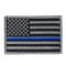 The Condor US Flag Patch features a black and white American flag with a single blue stripe across the center, honoring First Responder service and dedication.